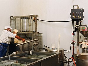 Photo: pressing out the soymilk