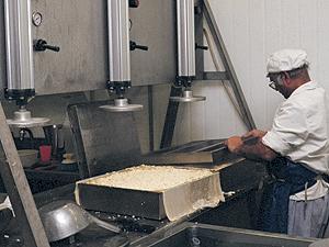 Photo: placing the lid on a pressing box