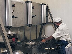 Photo: pressing the soymilk curds